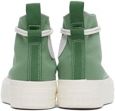 Converse.Green Chuck Taylor All Star Lift Platform Utility Sneakers.High-top bedford cord sneakers in green..· Rubber cap toe.· Wraparound lace-up closure.· Pull-tab at tongue.· Ripstop logo patch at inner side.· Eyelets at inner side.· Pull-loop at heel.· Cushioned Ortholite® insole.· Mesh lining.· Textured platform midsole.· Treaded rubber sole.· Platform: H1.75'.Supplier color: Herby/Egret/Admiral elm.Upper: textile. Sole: rubber..Made in Viet Nam..241799F127056 Green Converse High-top Sneakers With Rubber Sole, Green High-top Sneakers With Vulcanized Sole For Spring, Converse Green High-top Sneakers, Green Sporty Canvas High-top Sneakers, Green Converse High-top Sneakers, Green Converse Sneakers For Outdoor, Sporty Green Canvas High-top Sneakers, Green High-top Sneakers With Rubber Toe Cap, Green High-top Canvas Sneakers With Vulcanized Sole