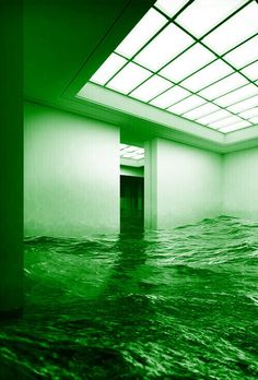 an empty room is flooded with water