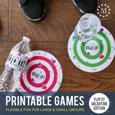 two paper plates with the words printable games next to each other on a wooden floor