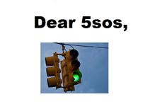 a green traffic light with the words dear 350's above it and below it