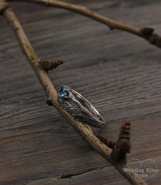 Tree bark topaz engagement ring, Branch silver wedding band, Birthstone ring, Unusual womens engagement ring, Unique gift for her ■ All my rings are only crafted with the finest of recycled metals DETAILS: Central Stone - 5mm Natural Topaz, weight approx. 0.66ct. Metal - Sterling Silver Dimensions - width 9mm (0.35 in.), band width - 2mm (0.078 in.) Finish - shiny and oxidize (shiny at your request) Please choose your ring size and gems in menu while making your order View all tree bands and rin Unique Sterling Silver Topaz Ring For Wedding, Unique Silver Promise Ring, Unique Blue Topaz Jewelry For Wedding, Nature-inspired Sterling Silver Wedding Gift, Unique Sterling Silver Topaz Ring For Anniversary, Unique Silver Topaz Ring For Wedding, Handmade Topaz Promise Ring, Unique Sterling Silver Topaz Promise Ring, Unique Handmade Topaz Wedding Ring