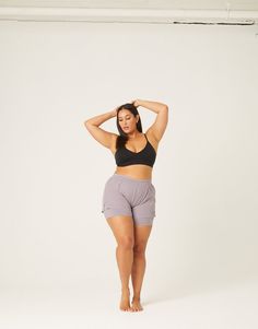 The Curve Lined Athletic Shorts are great for casual workouts or just casual outfits. These flowy, double-layered exercise shorts are lightweight and comfortable. The loose outer layer is made of a smooth, stretchy woven material and the fitted under layer made of a soft knit material. The shorts also feature one hidden pocket on the thigh of inner layer and an elastic waistband. These shorts are made from 90% polyester and 10% spandex and the lining is 88% polyester and 12% spandex. Model is we Plus Size Velvet, Exercise Shorts, Athleisure Pants, Dolphin Shorts, Stretchy Leggings, Plus Size Leggings, Comfort Wear, Pocket Leggings, Knitting Materials