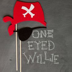 one eyed willie hat on top of a stick with the words, one eyed willie