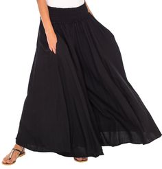 Get your comfort on with these wide leg palazzo pants. Flowy and free help bring out your bohemian side. Perfect for summer days because the material is lightweight and breathable. No heavy fabric here! Elastic waist and side pockets enhance the flowy pants. Easily dress up these pants with heels and a fun top or lounge around the house. Whatever you choose these pants will provide you comfort all day long. Wide and flowy pant legs Side pockets and elastic waistband Soft and lightweight material Bohemian Solid Color Harem Pants For Vacation, Bohemian Solid Wide Leg Pants For Beach, Neutral Color Bohemian Wide Leg Pants For Beach, Vacation Baggy Wide Leg Pants, Bohemian Style Solid Color Wide Leg Pants For Vacation, Solid Color Bohemian Wide Leg Pants For Vacation, Bohemian Solid Color Wide Leg Pants For Vacation, Wide Leg Pants For Vacation, Baggy Wide Leg Pants With Elastic Waistband For Beach