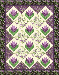 a quilt with purple flowers on it and green leaves in the middle, as well as an