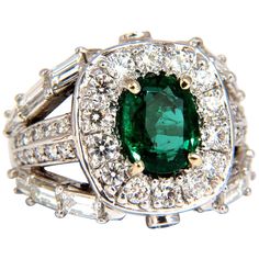 2.00ct. Natural emerald & 4.00ct. diamonds ring. Oval cut emerald, Clean Clarity Brilliant Vivid Bright Green sparkles from all angles Pristine Transparency 9.1 x 7.2mm Natural 4.00ct diamonds of baguettes & rounds Vs-2 clarity G-color 14kt. white gold 12.3 grams. Ring is .73 inch wide current ring size: 6.75 Depth: .29 inch May be resized, please inquire. $18,000 Appraisal Certificate to accompany Hey Friend, Emerald Rings, Ring Rosegold, Fancy Yellow Diamond, Ruby Diamond Rings, Emerald Diamond Ring, Diamonds Ring, Diamond Cocktail Rings, Citrine Ring