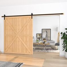 an open sliding door in a living room with hardwood floors and white walls, along with a rug on the floor