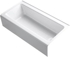 the bathtub is white and has a long, rectangular tub with an extended drain