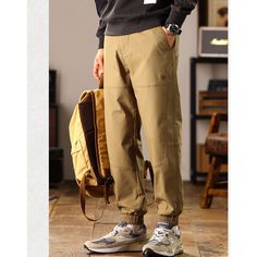 Spring/Fall Loose Washed Khaki Cargo Pants  Material: Cotton+Polyester   Material: 97% Cotton + 3% Spandex  Size: S, M, L, XL, 2XL, 3XL, 4XL Color: Khaki Pants Type: Cargo Pants Style Type: Street Trendy  Season: Spring, Fall, Winter,   Occasion: Leisure, Outdoor, Daily, Vacation, Fall Outfits Casual Ankle-length Pants For Outdoor Activities, Casual Loose Fit Khaki Joggers, Relaxed Fit Khaki Pants For Outdoor Activities, Baggy Khaki Casual Joggers, Casual Beige Pants For Outdoor Activities, Casual Stretch Sweatpants For Outdoor Activities, Casual Khaki Jogger Trousers, Casual Khaki Joggers For Outdoor, Casual Stretch Khaki Sweatpants