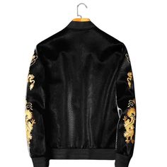 A high-quality Faux Fur Leather Jacket in Classic Black with exquisite Gold Dragon Embroidery. Fabric: Faux Leather Lining: Polyester Size: M to 4XL Color: Black Closing: Zipper Baseball Jacket Embroidery, Gold Dragon Color: Black Stand-up collar Gender: Male Age: Adult Brand Name: NoEnName_Null Product ID: CJWY136242501 Note: All sizes are 1 to 2 sizes smaller than European and American people. Choose the larger size if your size is between two sizes. Please allow 2-3cm differences due to manua Luxury Spring Outerwear With Floral Embroidery, Luxury Long Sleeve Outerwear With Floral Embroidery, Black Embroidered Winter Outerwear, Fitted Winter Outerwear With Gold Embroidery, Winter Outerwear With Gold Embroidery And Long Sleeves, Luxury Long Sleeve Outerwear With Gold Embroidery, Long Sleeve Leather Jacket With Floral Embroidery For Winter, Winter Leather Jacket With Floral Embroidery And Long Sleeves, Floral Embroidered Long Sleeve Leather Jacket For Winter