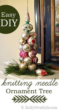 an ornament tree made out of ornaments is shown with the words easy diy