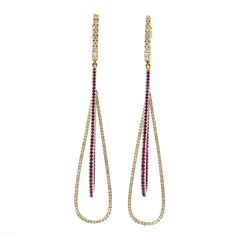 These elegant long drop earrings feature a stunning combination of sparkling 0.73-carat diamonds and vibrant 0.63-carat rubies. The intricate design showcases two delicate strands, one adorned with shimmering diamonds and the other with radiant rubies, creating a captivating contrast. Perfect for adding a touch of sophistication to any outfit. These beautiful earrings set in 18Kt yellow gold. Gold Long Earrings, Diamond Dangle Earrings, Long Drop Earrings, Long Dangle Earrings, Ruby Diamond, Elegant Earrings, Showcase Design, Earrings Set, Beautiful Earrings