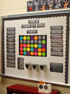 a bulletin board with cups on it in a school classroom setting for the month of march