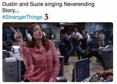 a woman wearing headphones standing in front of a computer screen with the caption, dustin and suzie singing neverending story strange things 3