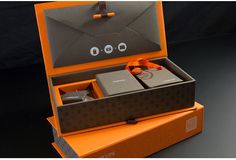 an orange box with two boxes in it