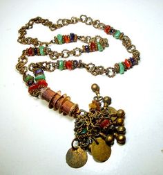 "Lariat Chain Necklace, Tribal India 1960s Coppery Brass w Gemstone Nuggets & Coins, Darkened and Moody From Age Something Old Jewelry, a Primitive Tribal Personal Piece Do not wear on a white shirt The Long coin chain Tassel Necklace is 28\" to the top of the tassel ( 71.12cm ) the Tassel is 4\" long by 2\" wide ( 10.16cm x 5.08cm ) all tarnished from age, ---------------------------------------------------------------------------- PLEASE NOTE I ONLY ship to your paid ETSY invoice address, Vintage Multicolor Multi-stone Jewelry, Vintage Adjustable Multicolor Necklaces, Bohemian Multicolor Brass Necklaces, Bohemian Multicolor Brass Necklace, Vintage Necklace With Vintage Charm For Festivals, Vintage Necklaces With Vintage Charm For Festival, Vintage Festival Necklace With Vintage Charm, Vintage Adjustable Necklace With Jewels, Vintage Adjustable Jeweled Necklace