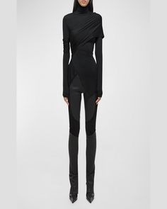 Find HELMUT LANG Draped Knit Turtleneck Top on Editorialist. Helmut Lang knit turtleneck top featuring draping throughout Long sleeves Fitted Cutaway hem Pullover style Lyocell/elastane Lining: Lyocell/elastane Machine wash cold Imported Black Cowl Neck Top For Night Out, Black Cowl Neck Top For Party, Black Cowl Neck Top For Evening, Black Draped Tops For Fall, Draped Tops For Fall Night Out, Draped Tops For Night Out In Fall, Black Fitted Knit Top For Evening, High Neck Tops For Winter Evenings, Fitted Black Knit Top For Evening