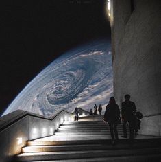 some people are walking up some stairs to the space station and there is a view of earth in the distance