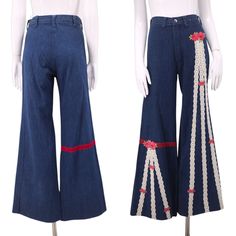 "1970s PETIT FORS Los Angeles 1970s high waisted denim bell bottoms with lace and velvet ribbon appliqués. These have an incredible cut and fit, snug through the hips and rear. Wide bells. No pockets with a plain front and rear and belt loops. Ultra high rise. Decorated with lace and velvet ribbon trim and small pink appliqué rosettes. Custom denim art ! Excellent condition. These have been hemmed with a generous 4.5\" allowance. Very faint yellowing on one small part of the lace, Otherwise exce 1970s Wide Leg Spring Jeans, 1970s Style Wide Leg Spring Jeans, 1970s Wide Leg Jeans For Spring, 1970s Fitted Wide Leg Flare Jeans, 1970s Style Fitted Wide Leg Flare Jeans, 1970s Style Wide Leg Jeans, Refashioned Jeans, Petit Fors, Bell Bottom Jeans 70s