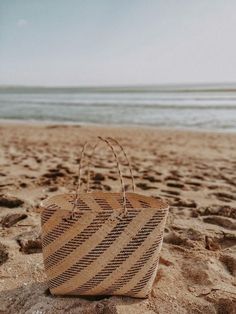 Handcrafted with natural rattan, this woven tote is perfect for beach days or countryside strolls. Free Shipping on All Our Rattan Bags Material: Made from 100% natural, soft rattan fibers, handwoven by skilled artisans in Bali. Eco-Friendly: Naturally dyed using bast fibers of rattan; patterns created with black (natural dye) and un-dyed rattan strips. Versatile Use: Perfect for trips to the market, beach, or any adventure. Spacious enough for oversized picnic blankets or towels. Features: Lightweight and durable for everyday use. Beautifully textured, showcasing intricate handwoven patterns. Each bag is unique, with slight variations in pattern design. Ethically and Sustainably Made: Supporting traditional craftsmanship and sustainable practices. Rattan bags blends effortlessly with any Braidsmaid Gifts, Metallic Cowhide Rug, Rattan Bags, Best Beach Bag, Rattan Handbags, White Cowhide Rug, Brindle Cowhide, Patchwork Cowhide Rug, Leather Toiletry Bag