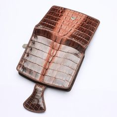 River twotone dark brown genuine crocodile tail skin leather wallet ~ new    Favour timeless leather goods and choose our TwoTone Brown Crocodile Skin Women's Wallet. Crafted to last, this understated walled exudes a demure elegance that everyone will notice. We use high-grade crocodile leather and celebrate all of its unique markings with a two-tone brown dye.      This picks up on all the intricate wrinkles and scales across the body, while also allowing it to pair effortlessly with the other Brown Business Wallets With Crocodile Pattern, Brown Crocodile Pattern Business Wallet, Formal Brown Wallet With Crocodile Pattern, Crocodile Tail, Womens Wallets, Crocodile Skin, Shades Of Brown, Crocodile Leather, Leather Goods