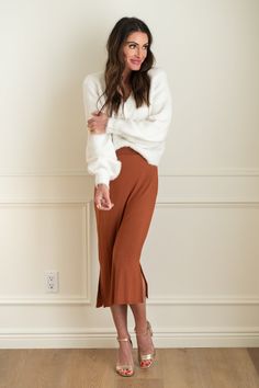 Chic Pencil Skirt For Loungewear, Knit Skirt For Spring Loungewear, Chic Lined Skirt For Loungewear, Chic Loungewear Skirt With Elastic Waistband, Chic Skirt With Elastic Waistband For Loungewear, Stretch Long Skirt For Loungewear, Fall Midi Skirt For Brunch, Chic Knit Skirt For Loungewear, Flowy Midi Skirt For Loungewear