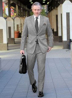 In the suiting world, versatility is a hard thing to find, but our Vintage Plain Gray Tweed Suit offers a sharp sartorial figure one can have. Crafted from wool, Whether you're attending an exclusive gala, a high-stakes boardroom meeting, or a grand wedding celebration, this suit ensures you command attention and admiration.  Look Includes    Vintage Plain Gray Tweed Fabric  Two Button Jacket Style  Notch Lapel  Horn Royal Black Buttons  Single Vent   Three Cuff Buttons  Two Welted Back Pockets Gray Tweed Suit, Grey Tweed Suit, Herringbone Tweed Jacket, White Linen Suit, Green Velvet Jacket, Peaky Blinders Suit, Royal Blue Suit, Grand Wedding, Tweed Suit