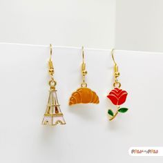 Capture the essence of romance with our Paris Eiffel Tower Earrings. Adorned in pink enamel, these chic and authentic pieces are inspired by "Emily in Paris." Ideal as a Paris travel gift or for adding a touch of Parisian flair to any outfit. Elevate your style with this timeless, romantic accessory. 🌸✨ Specification ✨🌸 * 18k Gold Plated Earrings * Enamel Charms ✨ Add a Personal Touch with Our Greeting Cards! ✨ Make your gift extra special by including one of our charming greeting cards. Choos Paris Jewelry, Emily In Paris, Paris Eiffel Tower, Pink Enamel, Enamel Charms, Stunning Earrings, Romantic Style, Paris Travel, Travel Gifts