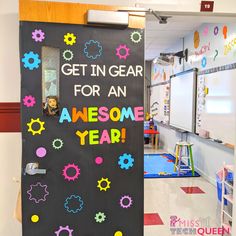 a classroom door decorated with gears and the words get in gear for an awesome year