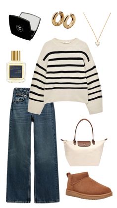 a sweater, jeans and purse are arranged in the shape of a woman's outfit