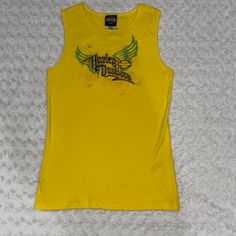 Harley Davidson Embroidered Yellow Tank Top. Size Large New Without Tags. Shop With Confidence! 5 Rated Posh Ambassador, Fast Shipping From A Clean Smoke Free Home! 100% Cotton Embroidered Michael’s Harley Davidson Cotati, California Limited Edition I63 Casual Yellow Tops With Embroidered Graphics, Yellow Cotton Top With Embroidered Graphics, Fitted Embroidered Yellow Tops, Fitted Yellow Embroidered Tops, Casual Yellow Embroidered Tops, Yellow Tank, Yellow Tank Top, Yellow Black, Black N Yellow