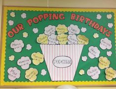 a bulletin board with popcorn on it and the words our popping birthdays written on it