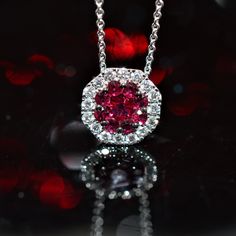 A Ladies 18K White Gold Adjustable 18 Inch Long 18K White Gold Chain With A Ruby And Diamond Octagonal Pendant. The Pendant Is Set With 9 Invisibly Set Round Genuine Rubies Surrounded By A Halo Of 16 Round Brilliant Cut Diamonds Having A Total Weight Of .27 Carats. White Gold Chain, Rose Gold Morganite, White Gold Chains, Halo Pendant, Diamond Anniversary Rings, Diamond Anniversary, Unique Gemstones, Beautiful Blouses, Mens Accessories Fashion