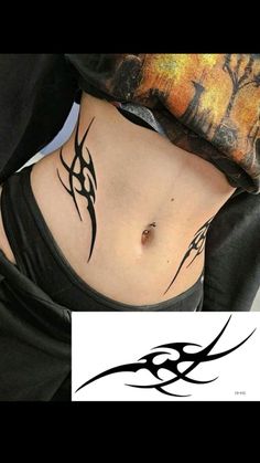 a woman with a tattoo on her stomach