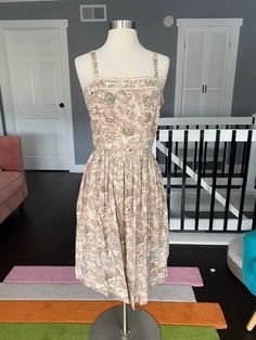 "Lovely tan and white pattern 1950'a day dress. Has a print of different vases and white ric rac on the edges. Metal zipper up the side. Great vintage condition, normal wear. Women's medium 36\" bust 30\" waist free hips 17\" shoulder to waist 24\" waist to hem" Light Pink Sneakers, Military Cap, Ric Rac, Pink Sneakers, Day Dress, Metal Zipper, White Patterns, Dress Clothes For Women, Vintage 1950s