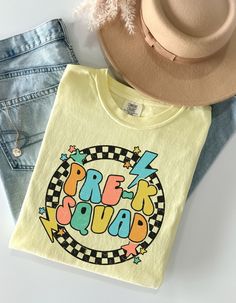 a pair of jeans and a t - shirt with the words prep squad on it