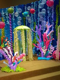 an under the sea theme with jellyfish and other decorations