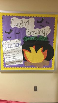 a bulletin board with writing on it that says conflict brewing and a fire in a pot