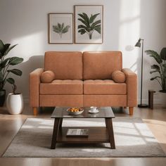 a living room scene with focus on the couch and coffee table