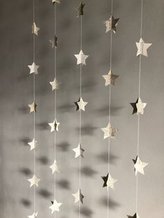 a mobile with stars hanging from it's sides