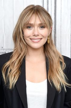 How To Cut Curtain Bangs Yourself, According To Stylists Elizabeth Olsen Bangs, Liz Olsen, Elizebeth Olsen, Lizzie Olsen, Long Blonde, Long Blonde Hair