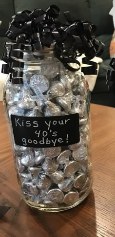 a glass jar filled with lots of coins