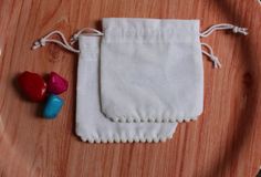 Pretty small white Cotton pouches with bottom POMPOM .... Custom Cotton GIFT PURPOSE BAG.... Makeup pouch cotton pouch, cosmetic bag,Customized cotton print bag, personalize coin bag drawstring Set of 200 pouchesCOLOR----------->  white DRAWSTRING-->  COTTON ROPE (SPIRAL) STRING SIZE -------------->  CUSTOM SIZE ARE ALSO AVAILABLEMATERIAL-------> 100% PURE COTTON FABRIC WITH  20X20 SITTING                          USES------------->  for store the little and precious thing like je Cotton Jewelry, Logo Jewelry, Cotton Pouch, Floral Purse, Personalized Logo, Cotton Gifts, Coin Bag, Bags Logo, Makeup Pouch