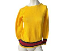 "Vintage 70's yellow sweater, tag says Pronto, sz M, 100% acrylic. Sweater is bright yellow, has black and red stripes, sweater is in great condition, measurements are shoulder to shoulder 17\" bust 34\" waist up to 28\" length 23.5\" sleeve length 22.5\"" Retro Yellow Long Sleeve Sweater, Retro Yellow Crew Neck Sweater, Mustard Retro Long Sleeve Sweater, Vintage Yellow Long Sleeve Sweater, Retro Yellow Winter Sweater, Retro Yellow Sweater For Fall, Black Silk Camisole, Goddess Maxi Dress, Sweater Tag