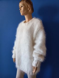 White Mohair Sweater With Crew Neck, White Mohair Crew Neck Sweater, Cozy Soft Knit White Sweater, White Cozy Soft Knit Sweater, Cozy White Soft Knit Sweater, Winter Hand Knitted White Top, Hand Knitted White Winter Top, Winter White Hand Knitted Top, White Knitted Crew Neck Sweater