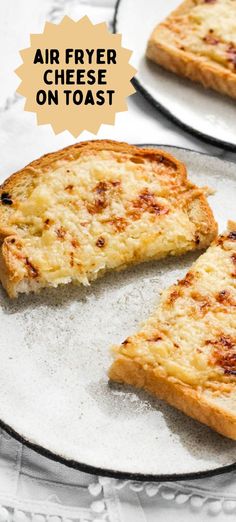 two slices of cheese pizza sitting on top of a white plate with the words air fryer cheese on toast