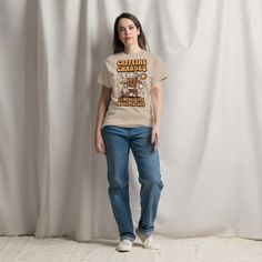 The 100% cotton unisex classic tee will help you land a more structured look. It sits nicely, maintains sharp lines around the edges, and goes perfectly with layered streetwear outfits. Plus, it's extra trendy now!   * 100% cotton  * Sport Grey is 90% cotton, 10% polyester  * Ash Grey is 99% cotton, 1% polyester  * Heather colors are 50% cotton, 50% polyester  * Fabric weight: 5.0-5.3 oz/yd² (170-180 g/m²)   * Open-end yarn  * Tubular fabric  * Taped neck and shoulders  * Double seam at sleeves Blue Halloween, Halloween Top, Coffee Shirt, Coffee Tshirt, Tubular Fabric, Spooky Vibes, Coffee Enthusiast, Layered Streetwear, Halloween Tees