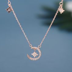 Description & Details The moon, sun, and stars became the representations of gods and goddesses throughout the years as ways to explain their presence and permanence. Solid 925 sterling silver, cubic zirconia Hypoallergenic, gold plating 14 mm charm 16-18 inch chain, adjustable Celestial Rose Gold Sterling Silver Necklaces, Celestial Rose Gold Cubic Zirconia Jewelry, Rose Gold Sterling Silver Celestial Necklace, Celestial Rose Gold Necklace With Moon Phase, Rose Gold Celestial Necklace With Moon Phase, Dainty Rose Gold Charm Necklaces With Cubic Zirconia, Celestial Rose Gold Moon Phase Necklace, Dainty Rose Gold Cubic Zirconia Charm Necklaces, Dainty Rose Gold Charm Necklace With Cubic Zirconia