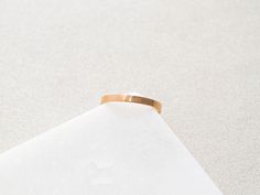 Our simple and dainty Solid Flat Band Ring can be layered with any of our stacking rings. Made with gold filled and sterling silver materials means they can be worn with minimal maintenance. This ring is also available with engraving and personalization, see other listings on our site.• Ring is about 2.5mm tall• Whole ring sizes in 4, 5, 6, 7, 8, 9These have been known to run on the small side, size up if between sizes. *if you are unsure of the ring size we have a printable PDF ring sizer, clic Minimalist Gold Stackable Bands, Minimalist Stackable Rose Gold Bands, Minimalist Yellow Gold Toe Ring Bands, Minimalist Stackable Gold Bands, Minimalist Recycled Gold Stackable Toe Rings, Minimalist Stackable Midi Rings In Recycled Gold, Minimalist Stackable Recycled Gold Midi Rings, Simple Everyday Stackable Rings In Recycled Gold, Minimalist Adjustable Stackable Rose Gold Rings