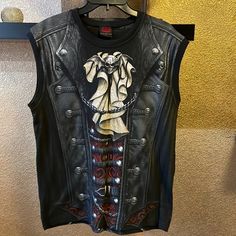 Mens Size Large New Without Tags! Pet And Smoke Free Home No Steam Punk Biker Should Be Without This. Realistic Leather, Laces & Buckles With A Metallic Winged Skull And Cravat. This Is Heavy Metal With A Twist Of Victorian Elegance, And Every Bit The Gothic Spiral Masterpiece. Allover Sleeveless T-Shirt Black Is Made Of Top Quality 100% Cotton, Interlock Using Skin Friendly, Azo-Free, Reactive Dyes. Sleeveless Blouse Outfit, Victorian Elegance, Winged Skull, The Gothic, Sleeveless T Shirt, Steam Punk, Sleeveless Tshirt, Sleeveless Blouse, Heavy Metal